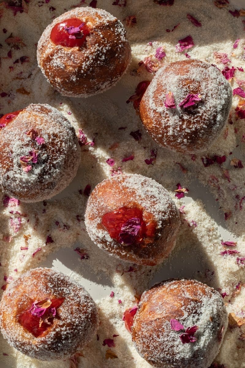 Overhead view of the filled strawberry rose paczki.