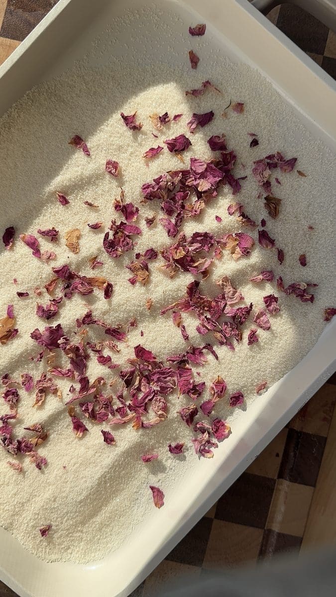 Rose sugar on a tray.