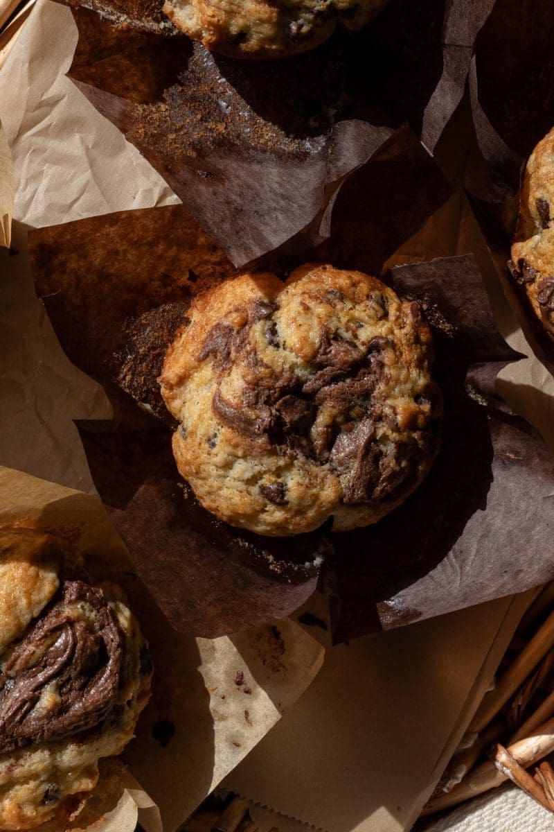 Close up top view of a small batch banana nutella muffin.