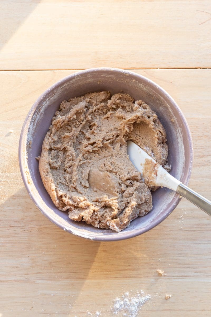 The finished cookie dough in a mixing bowl.