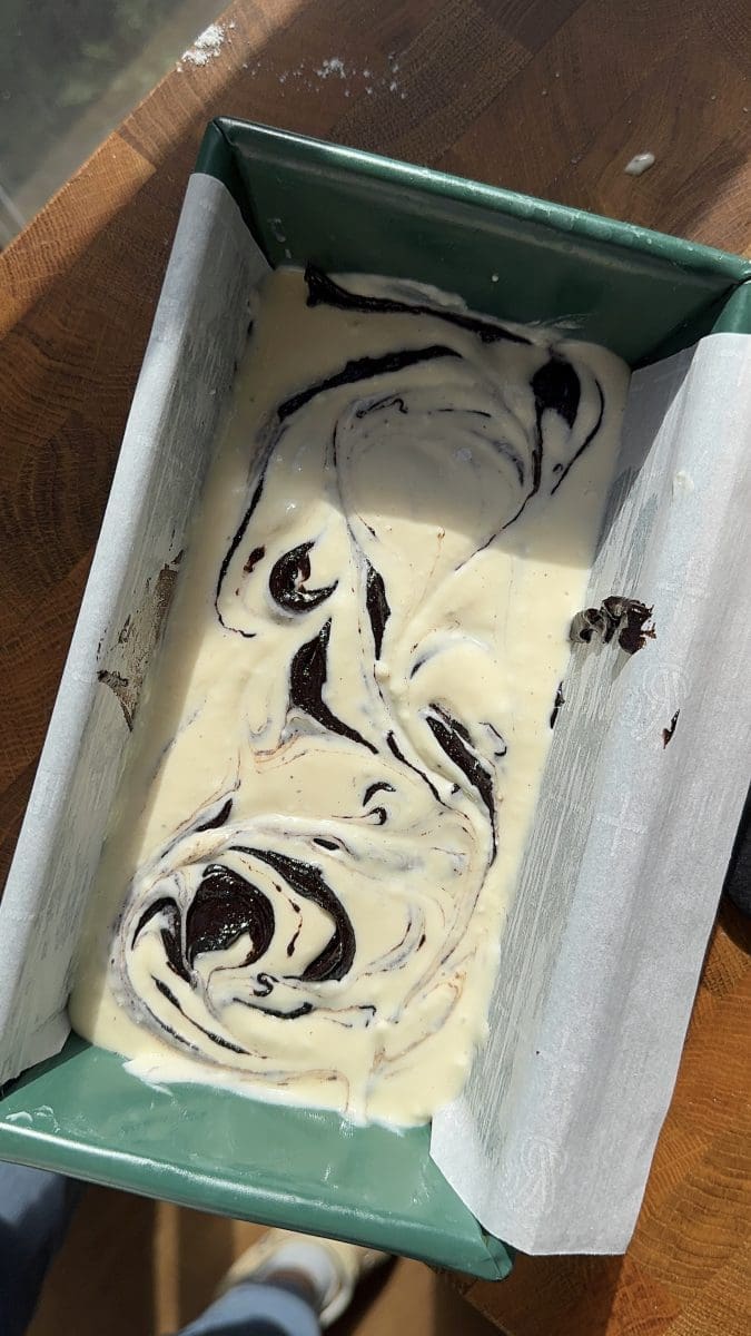 The batter swirled in the loaf pan.