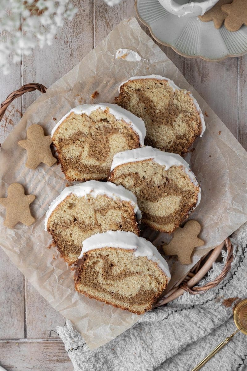 Slices of marbled gingerbread pound cake laying on top of each other.