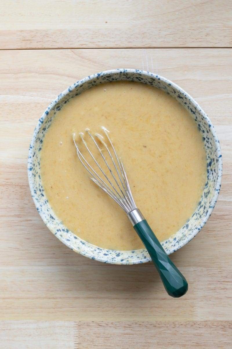 The batter after adding in the eggs, sour cream, and vanilla.