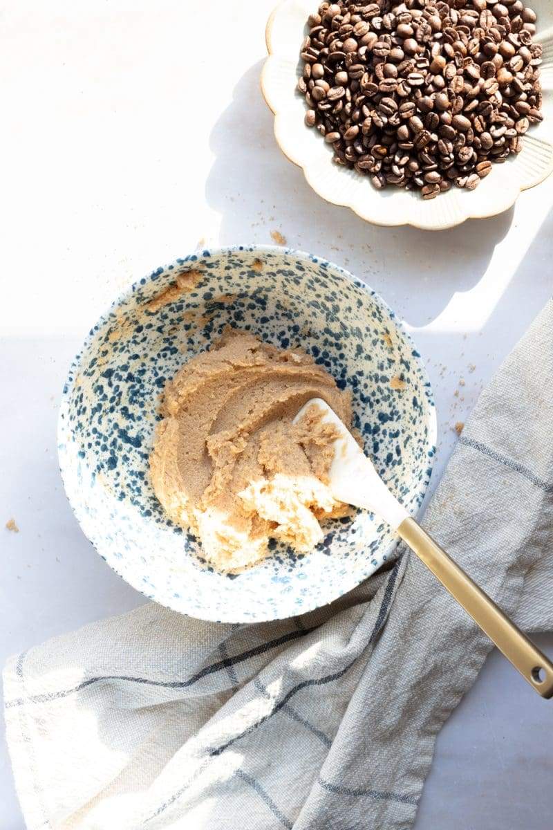 A mixing bowl, showing the brown sugar and butter beaten together