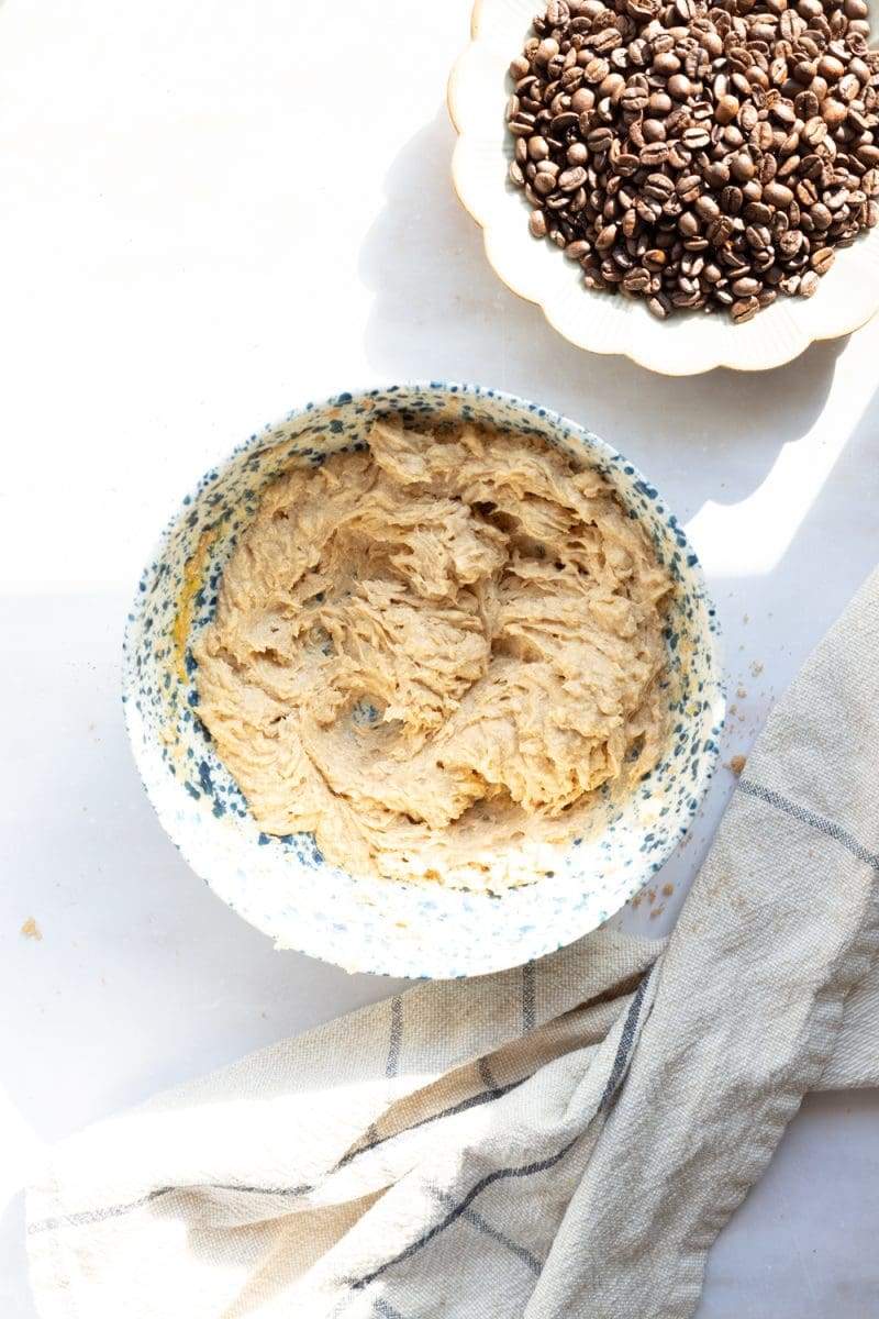 A mixing bowl, showing the dough after adding in the egg