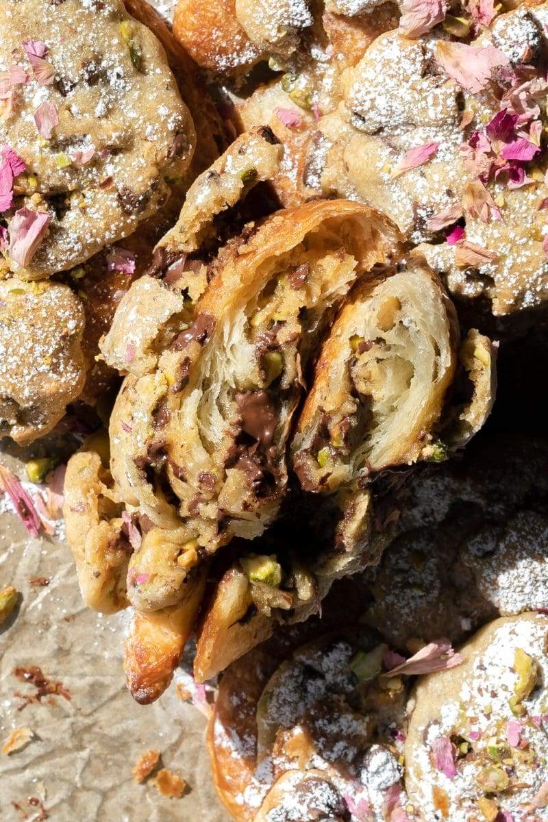 close-up of the cross-section of the pistachio rose cookie croissant