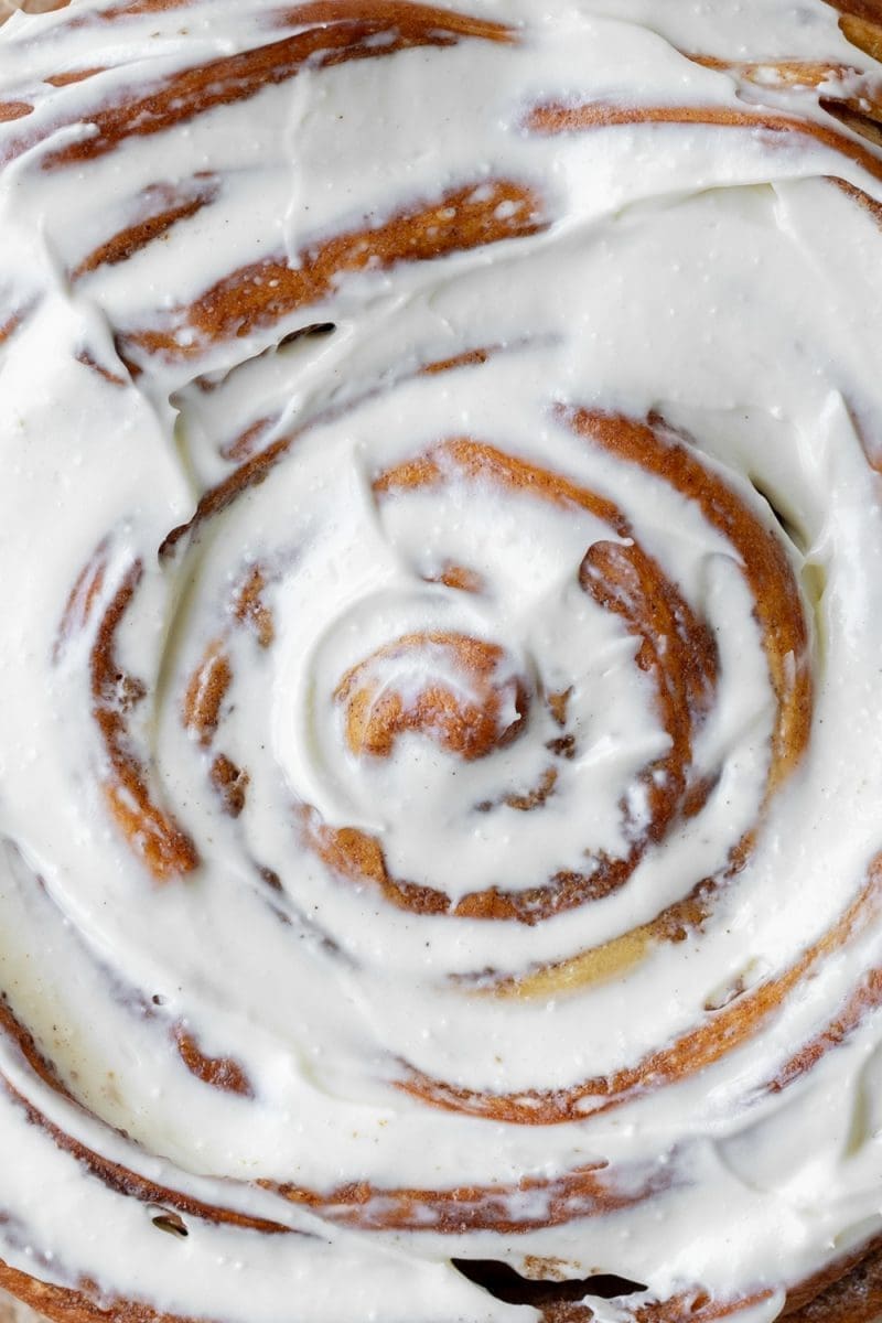Close up of the frosted giant cinnamon roll cake