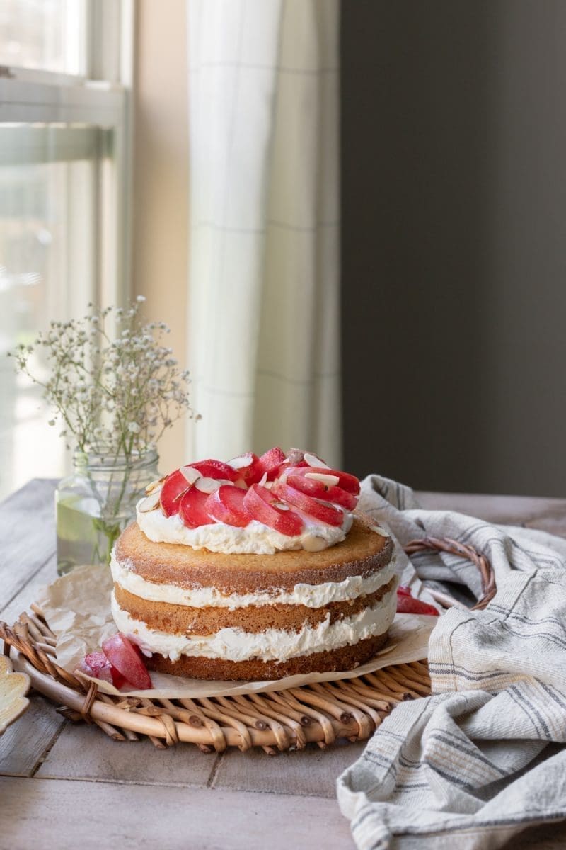 The almond cream cake on a serving tray.