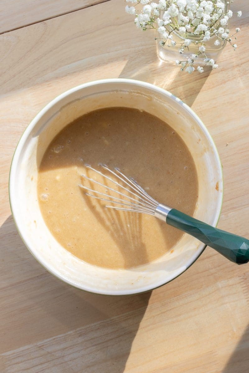 The wet ingredients whisked together in a mixing bowl.