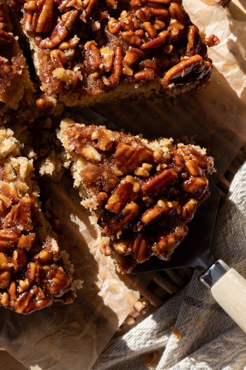 Close up of a slice of the banana pecan upside down cake.