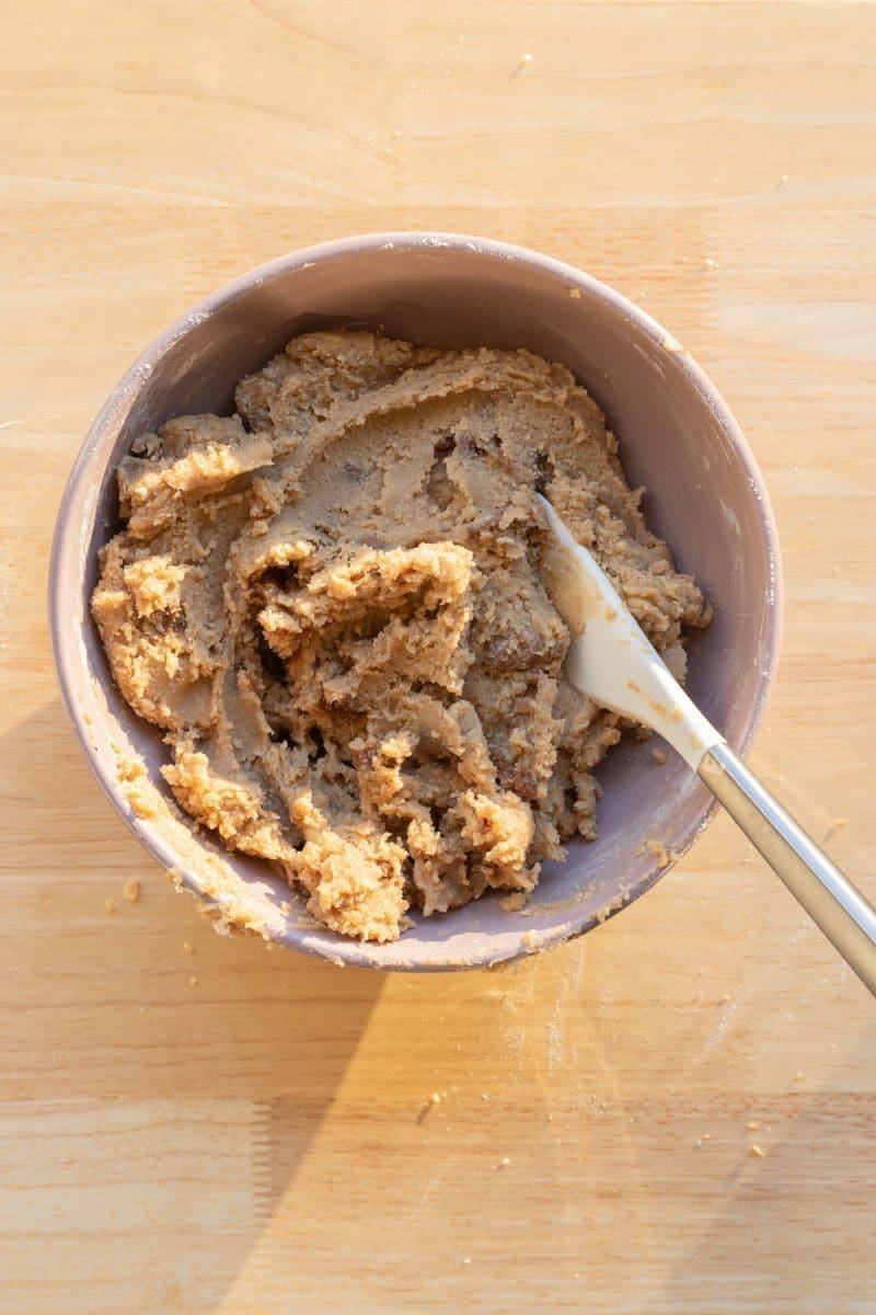 The finished cookie dough in a mixing bowl.