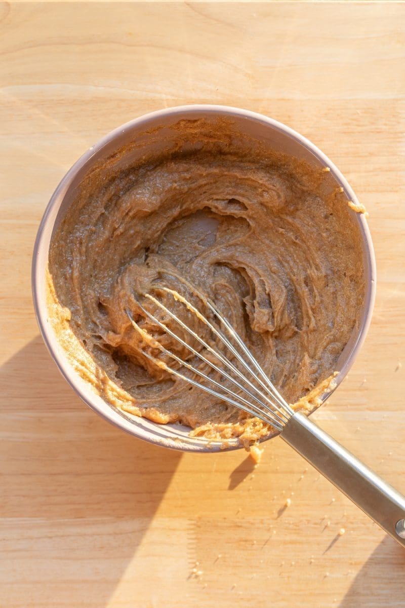 The wet ingredients whisked together in a mixing bowl.