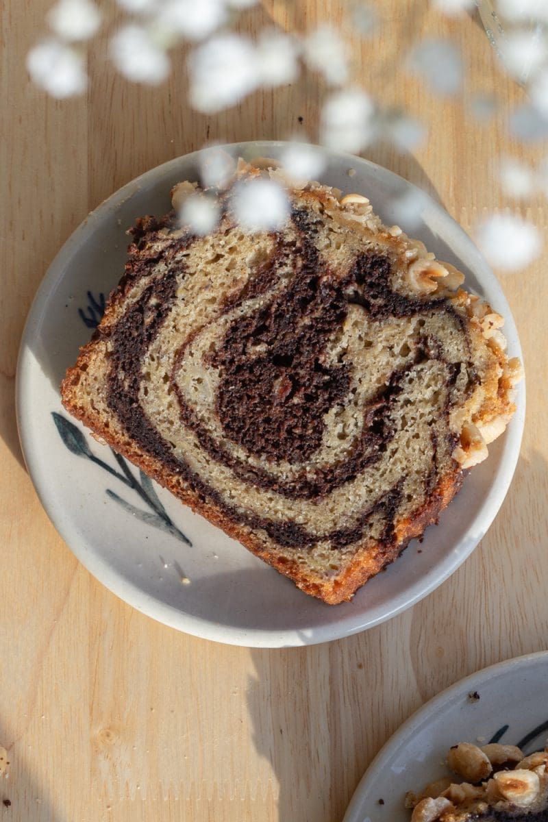 Close up of a slice of the chocolate marbled banana bread.