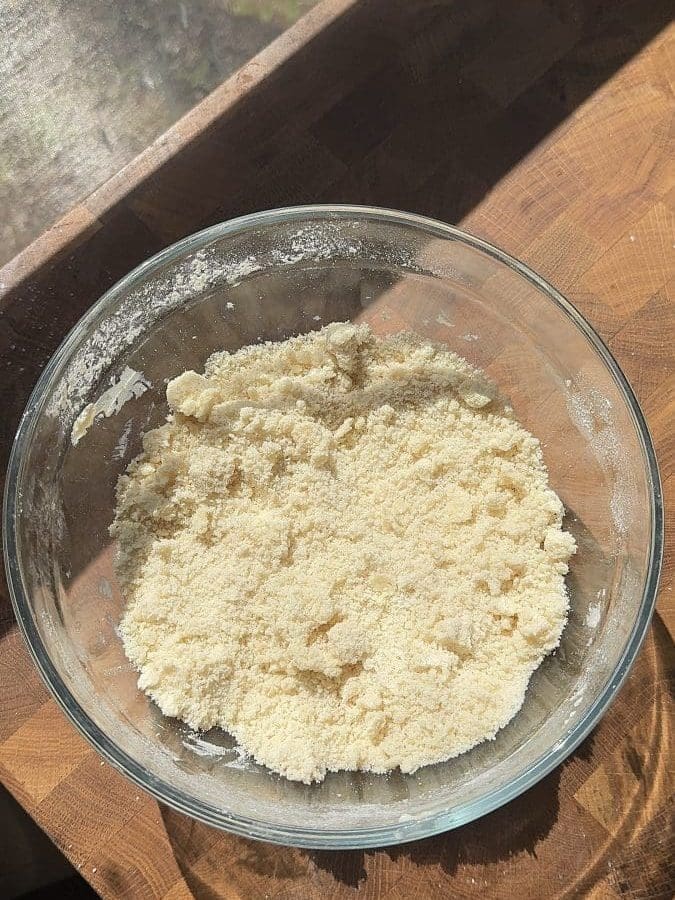 The dry ingredients and butter beaten together.