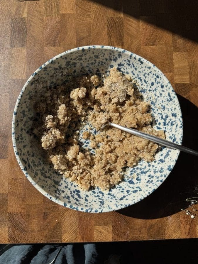 Shortbread crust in a mixing bowl.
