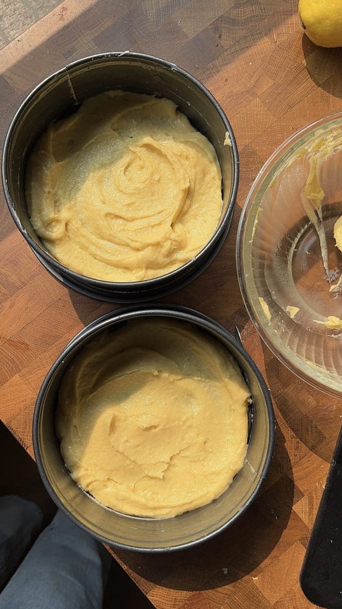 Choux pastry divided between two pans.
