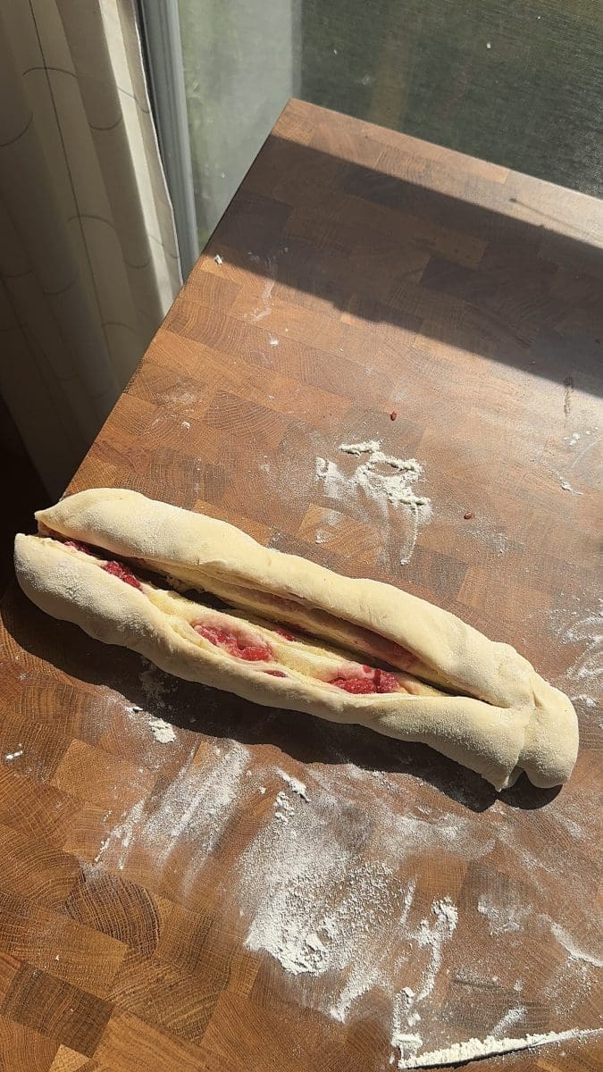 Splitting the dough in half.