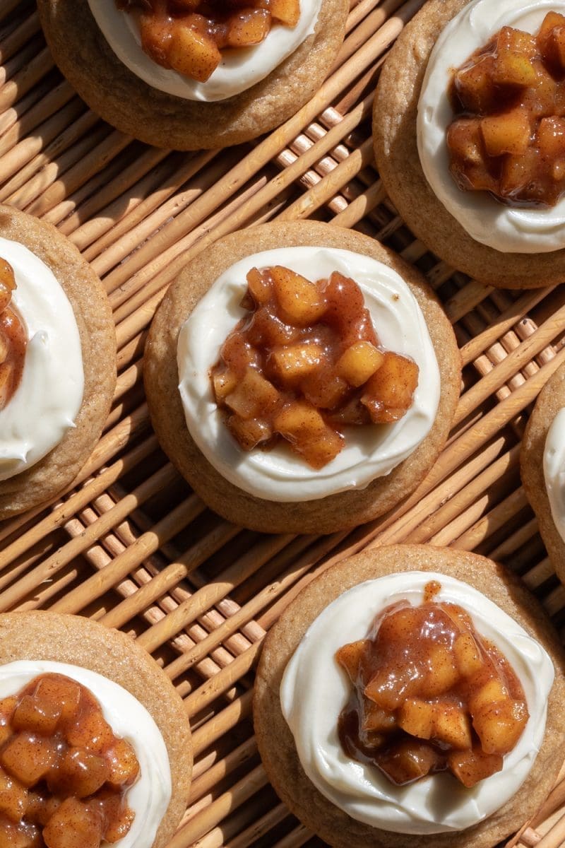 The apple pie cheesecake cookies on a tray.