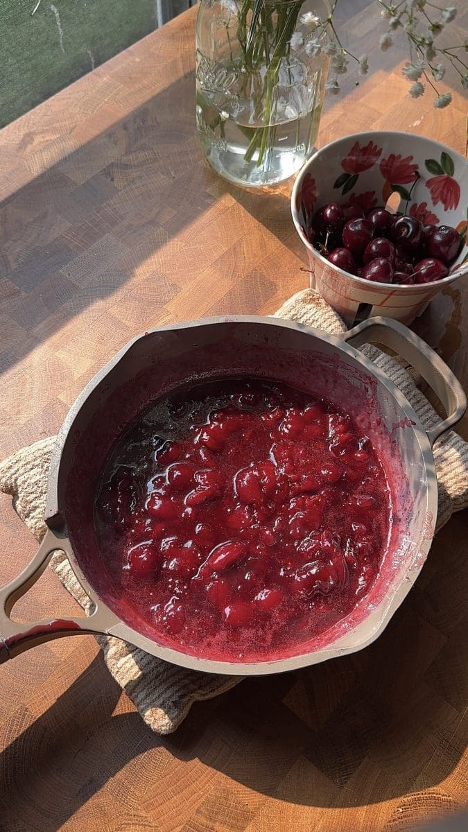 Cherry jam in a saucepan.