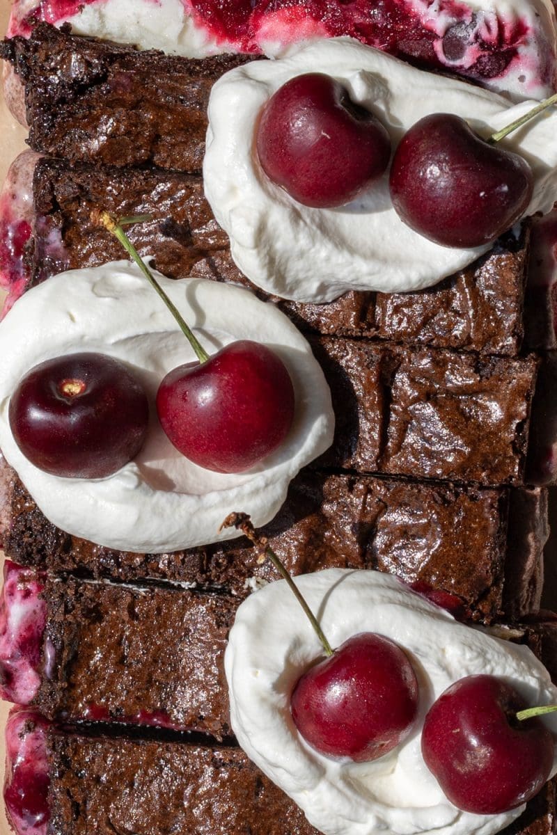 Close up of the tops of the cherry brownie ice cream sandwiches.