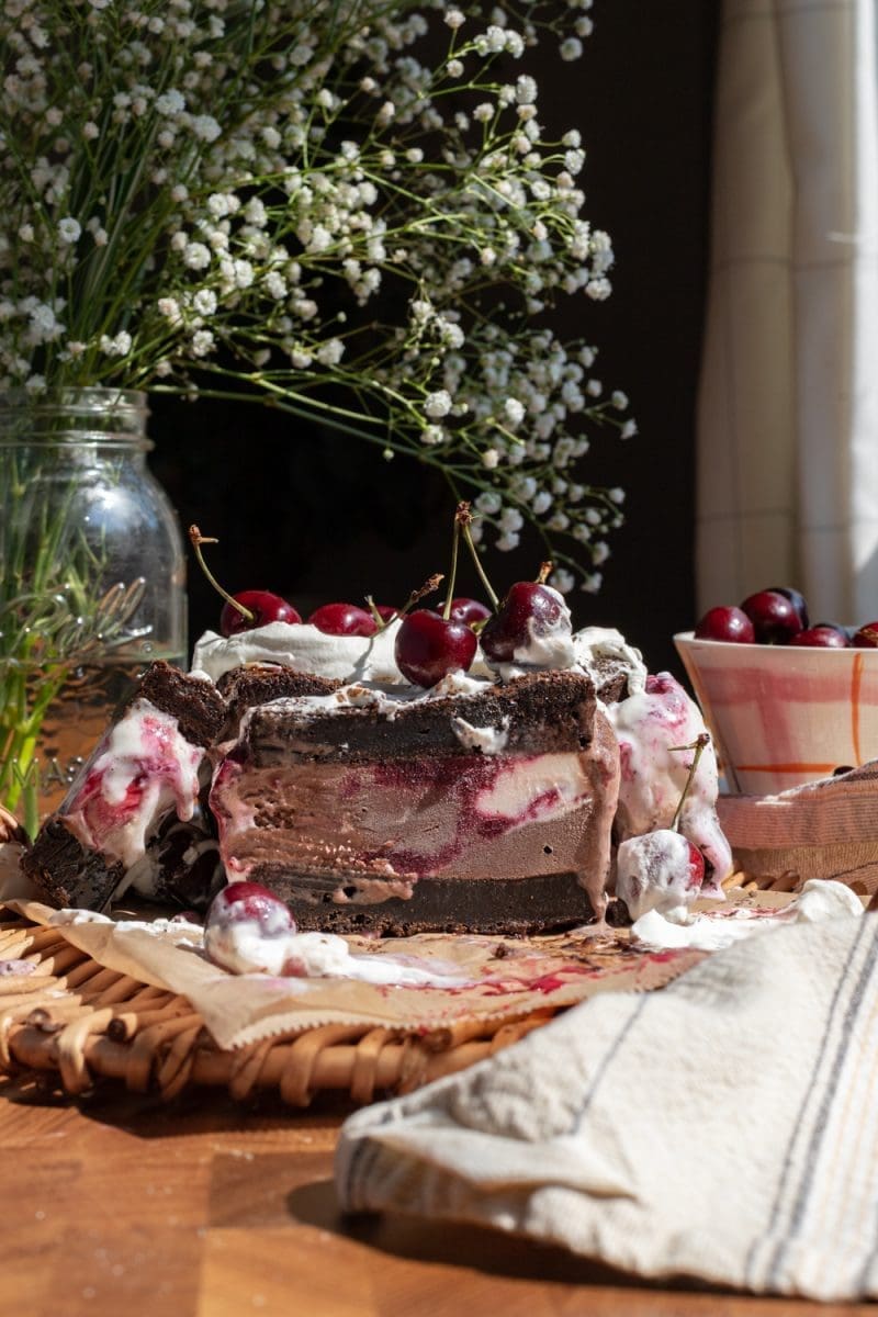A slice of the cherry brownie ice cream sandwiches.