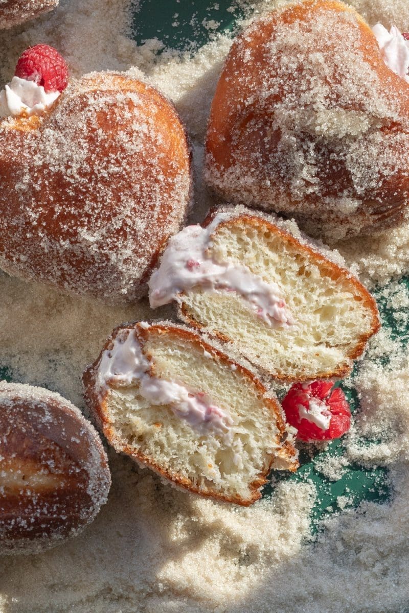 Cross-section of the raspberry cheesecake heart donuts.