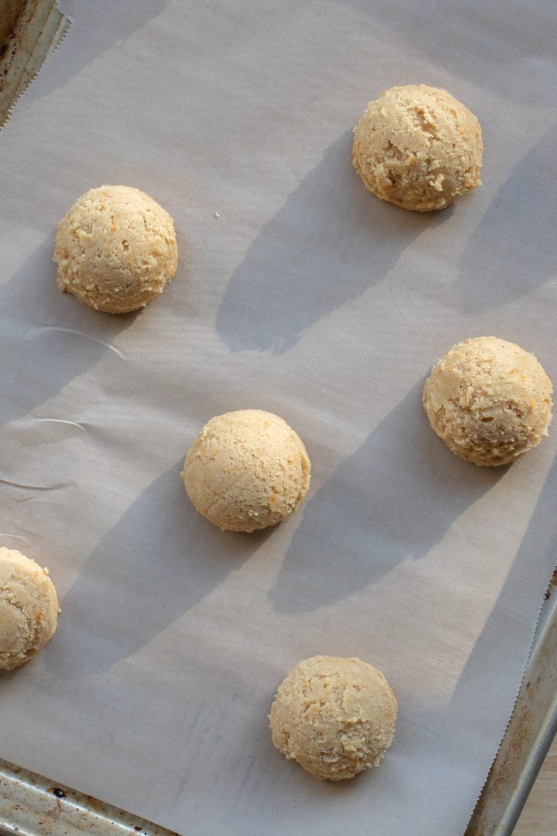 The sugar cookie dough on a baking tray.