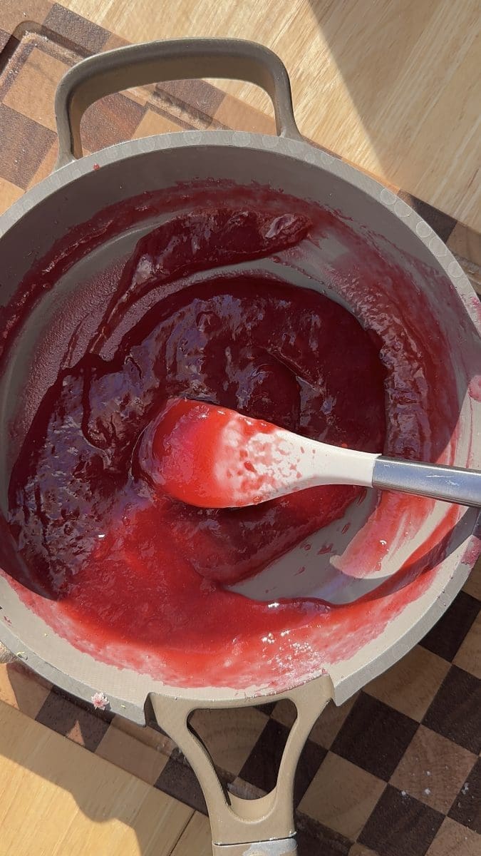 The finished jam in a saucepan.