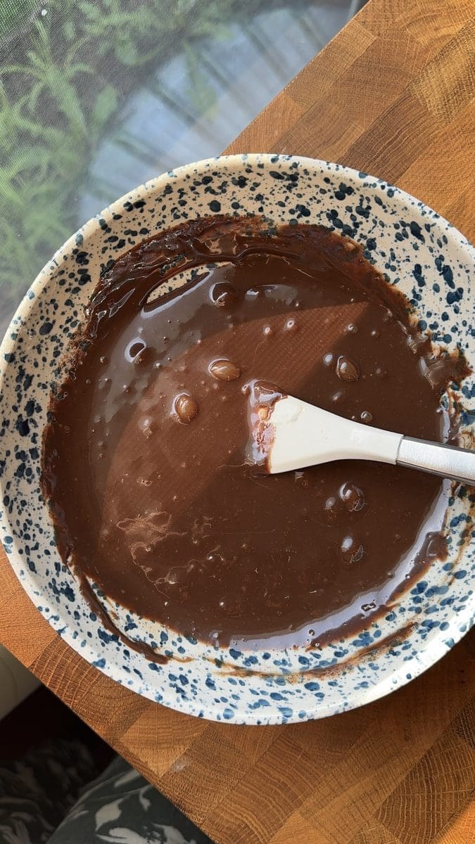 Chocolate fudge sauce in a mixing bowl.