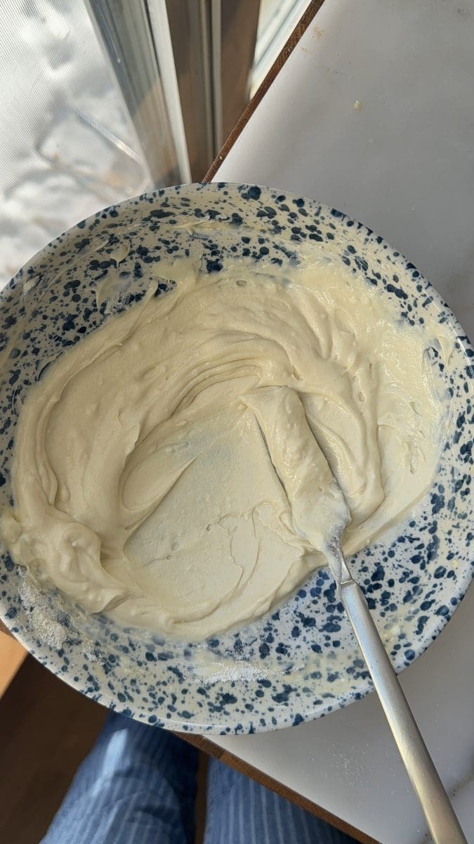 Cheesecake filling in a mixing bowl.